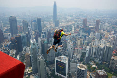 Kuala Lumpur, Malaysia â September 29, 2018: Base Jumpers landed from a 300m high deck during the Kuala Lumpur Tower International Jump.のeditorial素材