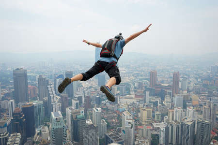 Kuala Lumpur, Malaysia â September 29, 2018: Base Jumpers landed from a 300m high deck during the Kuala Lumpur Tower International Jump.のeditorial素材