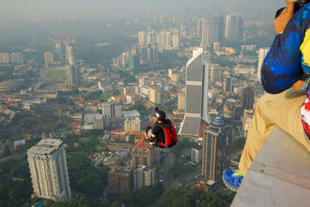 Kuala Lumpur, Malaysia â€“ September 29, 2018: Base Jumpers landed from a 300m high deck during...