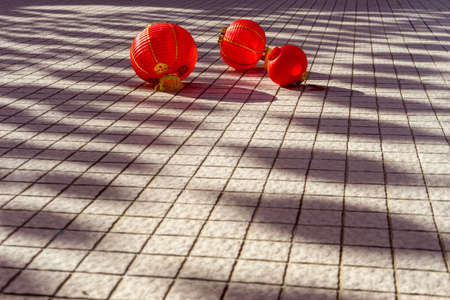 The beautiful decoration of Red Lantern during  Chinese New Year at the temple. The image contains certain grain or noise and soft focus.の写真素材