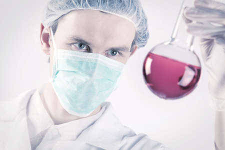 Scientist Holding Flask