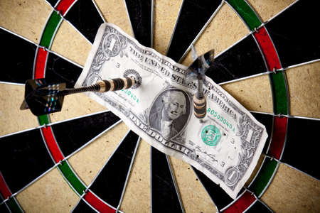Money on dartboardの写真素材