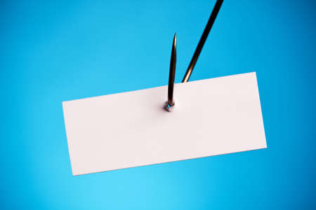 blank piece of paper on hookの写真素材