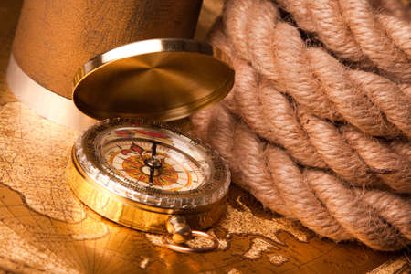 old map, compass and navigation equipment