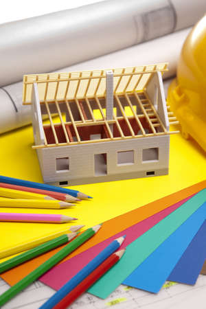 Construction plans with helmet and drawing tools on blueprintsの写真素材