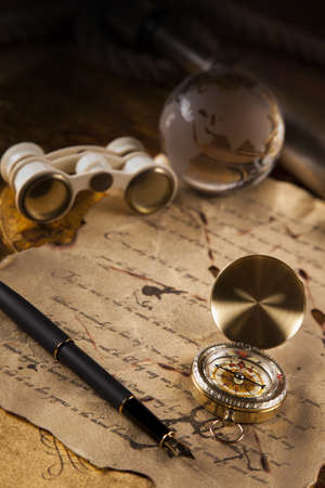 Vintage navitagion equipment, letter and mapsの写真素材