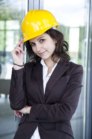 Young female construction engineer with phoneの写真素材