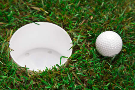 Golf ball on the green grass  Studio Shot の写真素材