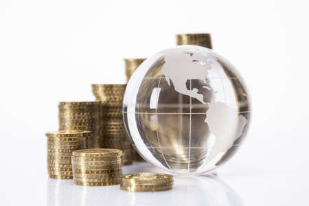Financial concept  World and money isolated on white backgroundの写真素材