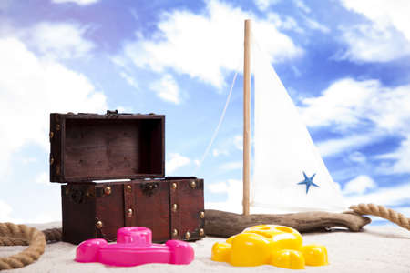 Fun on the beach with a lot of toys の写真素材