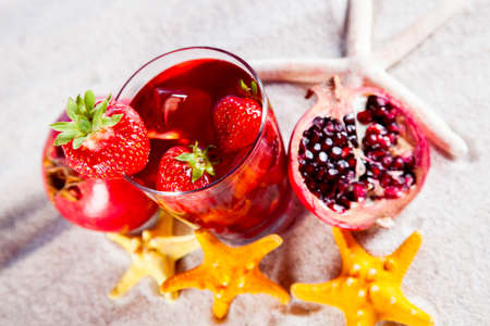 Tropical drinks on beach and sunの写真素材