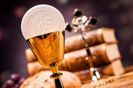 Sacred objects, bible, bread and wine.の写真素材