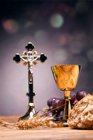 Sacred objects, bible, bread and wine.の写真素材