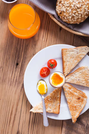 English breakfast on dark wooden table. Studio shootの写真素材