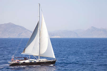 sail boat on the sea in deep blue colour