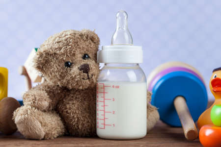 Children's World toy on a wooden background. Studio shot]の写真素材