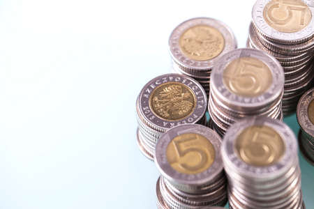 Financial concept with a lot of coins on white backgroundの写真素材