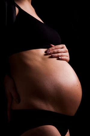 Young and beautiful mom waiting for the babyの写真素材