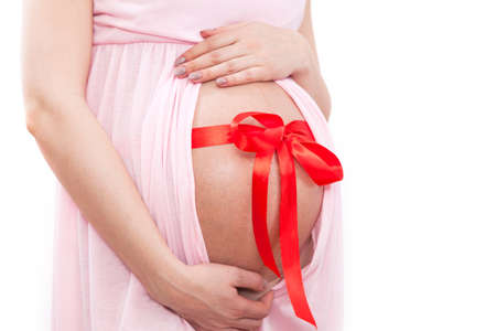 Pregnant woman expects baby. Excellent gift.の写真素材