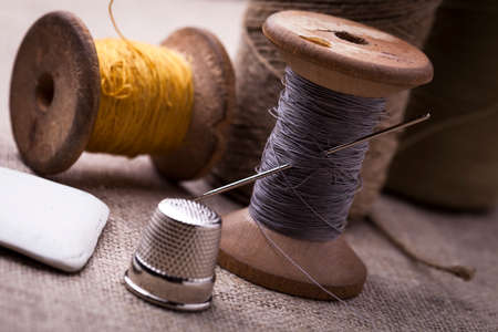 Sewing instruments, threads, needles, bobbins and materials. Studio photoの写真素材
