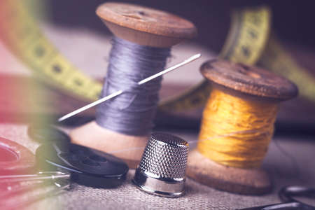 Sewing instruments, threads, needles, bobbins and materials. Studio photoの写真素材