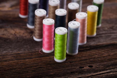 Sewing instruments, threads, needles, bobbins and materials. Studio photoの写真素材