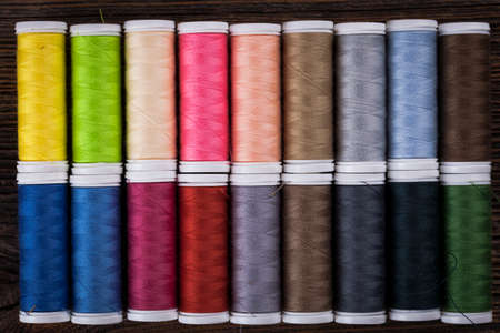 Sewing instruments, threads, needles, bobbins and materials. Studio photoの写真素材