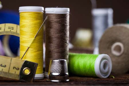 Sewing instruments, threads, needles, bobbins and materials. Studio photoの写真素材