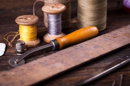 Sewing instruments, threads, needles, bobbins and materials. Studio photoの写真素材