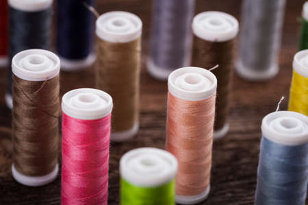Sewing instruments, threads, needles, bobbins and materials. Studio photoの写真素材