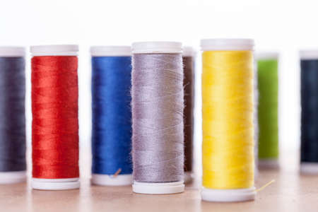 Sewing instruments, threads, needles, bobbins and materials. Studio photoの写真素材