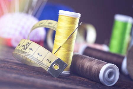 Sewing instruments, threads, needles, bobbins and materials. Studio photoの写真素材