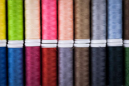Sewing instruments, threads, needles, bobbins and materials. Studio photoの写真素材