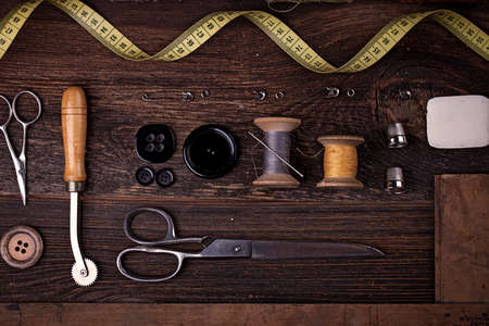 Sewing instruments, threads, needles, bobbins and materials. Studio photoの写真素材