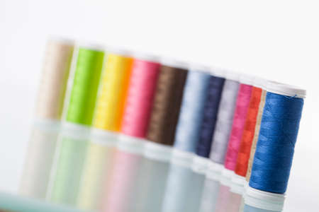 Sewing threads isolated on white background. Studio Shot