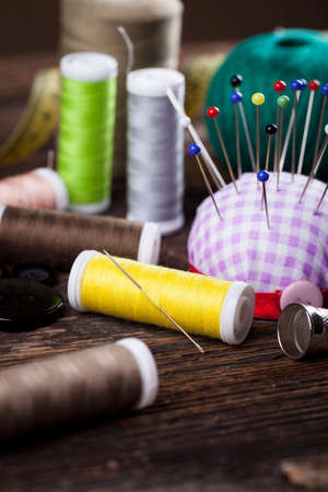 Sewing instruments, threads, needles, bobbins and materials. Studio photoの写真素材