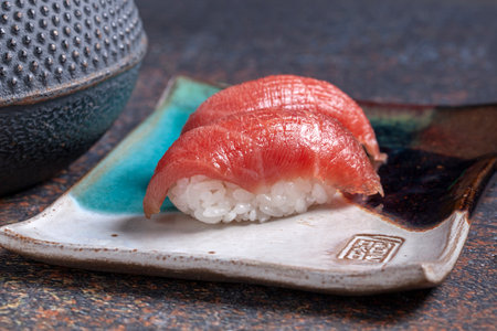 Traditional Japanese food - nigiri sushi served on a plateの写真素材