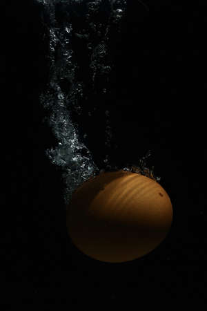 egg drop under waterの写真素材