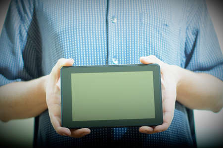 holding  tablet pc  の写真素材