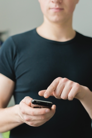 Man using a smartphoneの写真素材