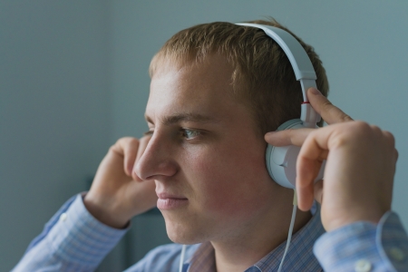 Man listening to music on smartphoneの写真素材