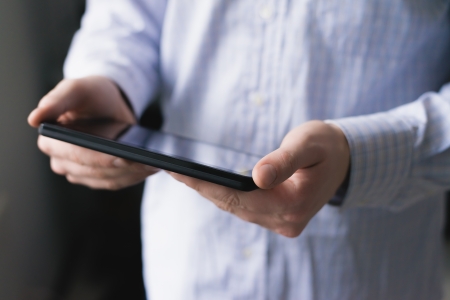 Man using digital tabletの写真素材