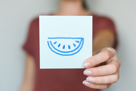 drawing image watermelon in handの写真素材