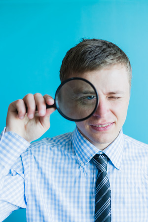 businessman with a magnifying glassの写真素材
