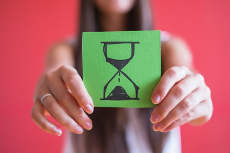 Picture icon hourglass in handの写真素材