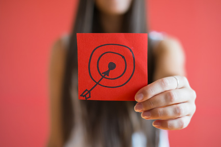 Figure target icon in the handの写真素材