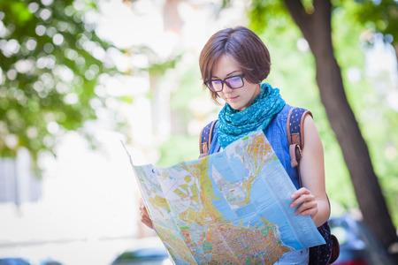 Woman tourist with mapの写真素材
