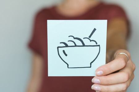 Picture icon in the hands of porridgeの写真素材