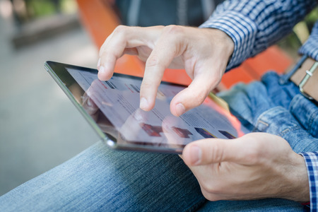 High resolution businessman holding digital tabletの写真素材