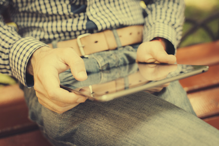 High resolution businessman holding digital tablet